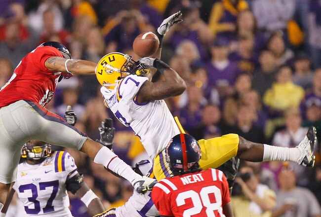 BATON ROUGE, LA - NOVEMBER 20:  Patrick Peterson #7 of the Louisiana State University Tigers nearly intercepts a pass in the final seconds against Markeith Summers #16 and Korvic Neat #28 of the Ole Miss Rebels as time expired at Tiger Stadium on November 20, 2010 in Baton Rouge, Louisiana.  (Photo by Kevin C. Cox/Getty Images)