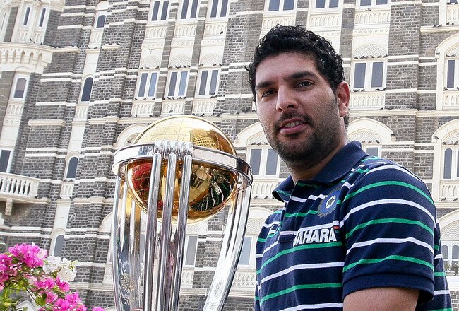 MUMBAI, INDIA - APRIL 03:  Yuvraj Singh of the Indian cricket team poses with the  ICC Cricket World Cup Trophy during a photo call at the Taj Palace Hotel on April 3, 2011 in Mumbai, India.  (Photo by Ritam Banerjee/Getty Images)