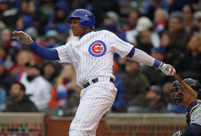 CHICAGO, IL - APRIL 20: Starlin Castro #13 of the Chicago Cubs takes a swing against the San Diego Padres at Wrigley Field on April 20, 2011 in Chicago, Illinois. The Cubs defeated the Padres 2-1 in 11 innings. (Photo by Jonathan Daniel/Getty Images)