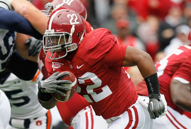 TUSCALOOSA, AL - NOVEMBER 26:  Mark Ingram #22 of the Alabama Crimson Tide rushes for a touchdown against the Auburn Tigers at Bryant-Denny Stadium on November 26, 2010 in Tuscaloosa, Alabama.  (Photo by Kevin C. Cox/Getty Images)