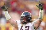 LOS ANGELES, CA - DECEMBER 05:  Defensive end Brooks Reed #42 of the Arizona Wildcats celebrates after stopping the USC Trojans on the final play on December 5, 2009 at the Los Angeles Coliseum in Los Angeles, California. Arizona won 21-17.  (Photo by Stephen Dunn/Getty Images)
