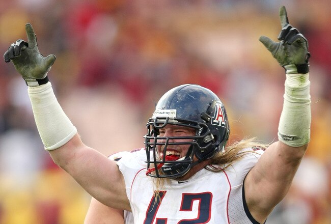 LOS ANGELES, CA - DECEMBER 05:  Defensive end Brooks Reed #42 of the Arizona Wildcats celebrates after stopping the USC Trojans on the final play on December 5, 2009 at the Los Angeles Coliseum in Los Angeles, California. Arizona won 21-17.  (Photo by Stephen Dunn/Getty Images)