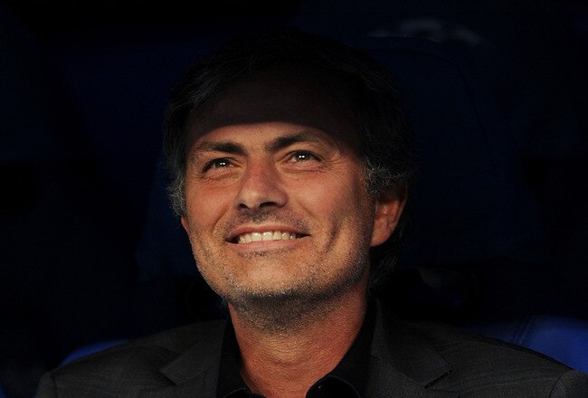 MADRID, SPAIN - APRIL 27:  Head coach Jose Mourinho of Real Madrid smiles during the start of the UEFA Champions League Semi Final first leg match between Real Madrid and Barcelona at the Estadio Santiago Bernabeu on April 27, 2011 in Madrid, Spain.  (Photo by Jasper Juinen/Getty Images)