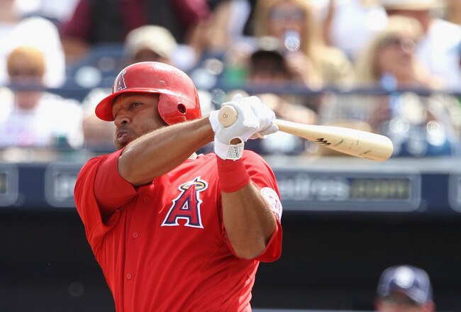 PEORIA, AZ - MARCH 15:  Vernon Wells #10 of the Los Angeles Angels of Anaheim bats against the San Diego Padres during the spring training game at Peoria Stadium on March 15, 2011 in Peoria, Arizona.  (Photo by Christian Petersen/Getty Images)
