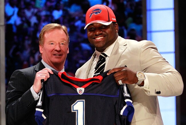 NEW YORK, NY - APRIL 28:  NFL Commissioner Roger Goodell poses for a photo with Marcell Dareus, #3 overall pick by the Buffalo Bills, as Dareus holds up a jersey during the 2011 NFL Draft at Radio City Music Hall on April 28, 2011 in New York City.  (Photo by Chris Trotman/Getty Images)
