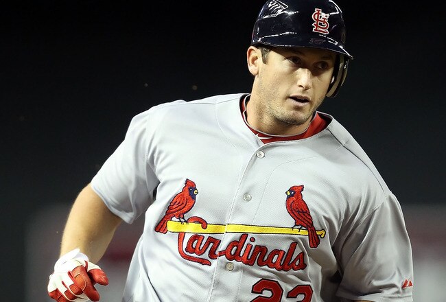 PHOENIX, AZ - APRIL 12:  David Freese #23 of the St. Louis Cardinals rounds the bases after hitting a solo home run against the Arizona Diamondbacks during the second inning of the Major League Baseball game at Chase Field on April 12, 2011 in Phoenix, Arizona. The Diamondbacks defeated the Cardinals 13-8.  (Photo by Christian Petersen/Getty Images)