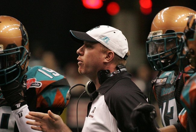 PHOENIX - JUNE 30:  Head coach Kevin Guy of the Arizona Rattlers talks during a game against the Grand Rapids Rampage at the US Airways Center in Phoenix, Arizona on June 30, 2008.  (Photo by Gene Lower/Getty Images)