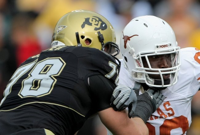 BOULDER, CO - OCTOBER 04:  Brian Orakpo #98 of the Texas Longhorns rushes against Nate Solder #78 the Colorado Buffaloes at Folsom Field on October 4, 2008 in Boulder, Colorado. Texas defeated Colorado 38-14.  (Photo by Doug Pensinger/Getty Images)