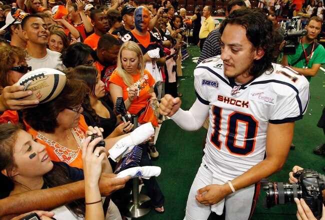 LAS VEGAS - AUGUST 22:  Quarterback Nick Davila #10 of the Spokane Shock greets fans after the team's 74-27 victory over the Wilkes-Barre/Scranton Pioneers in the AFL2 ArenaCup 10 at the Orleans Arena August 22, 2009 in Las Vegas, Nevada.  (Photo by Ethan Miller/Getty Images)