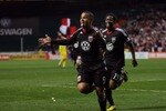 WASHINGTON, D.C. - MARCH 19: Charlie Davies #9 of D.C. United celebrates after scoring a goal against the Columbus Crew at RFK Stadium on March 19, 2011 in Washington, DC. (Photo by Ned Dishman/Getty Images)