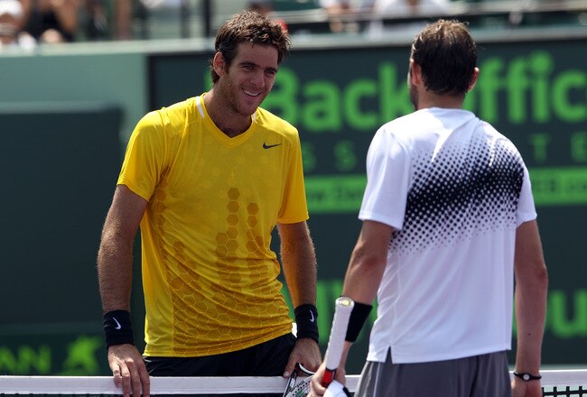 KEY BISCAYNE, FL - MARCH 29:  Mardy Fish is congratulated by Juan Martin Del Potro (L) of Argentina after Fish won their match during the Sony Ericsson Open at Crandon Park Tennis Center on March 29, 2011 in Key Biscayne, Florida.  (Photo by Matthew Stockman/Getty Images)