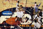 HOUSTON, TX - APRIL 04:  The Connecticut Huskies react after defeating the Butler Bulldogs to win the National Championship Game of the 2011 NCAA Division I Men's Basketball Tournament by a score of 53-41 at Reliant Stadium on April 4, 2011 in Houston, Texas.  (Photo by Andy Lyons/Getty Images)