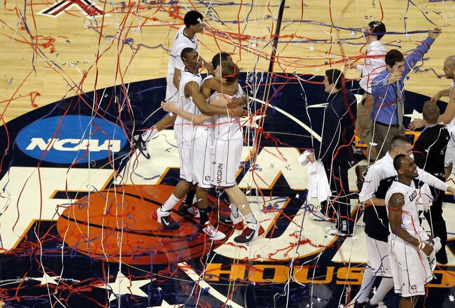 HOUSTON, TX - APRIL 04:  The Connecticut Huskies react after defeating the Butler Bulldogs to win the National Championship Game of the 2011 NCAA Division I Men's Basketball Tournament by a score of 53-41 at Reliant Stadium on April 4, 2011 in Houston, Texas.  (Photo by Andy Lyons/Getty Images)