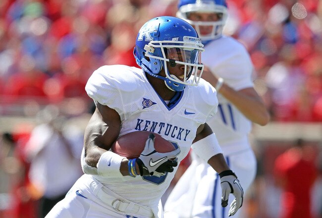 LOUISVILLE, KY - SEPTEMBER 04:  Randall Cobb #18 of the Kentucky Wildcats runs with the ball during the game against the Louisville Cardinals at Papa John's Cardinal Stadium on September 4, 2010 in Louisville, Kentucky.  (Photo by Andy Lyons/Getty Images)