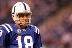 INDIANAPOLIS, IN - JANUARY 08:  Quarterback Peyton Manning #18 of the Indianapolis Colts looks on against the New York Jets during their 2011 AFC wild card playoff game at Lucas Oil Stadium on January 8, 2011 in Indianapolis, Indiana. The Jets won 17-16. (Photo by Andy Lyons/Getty Images)