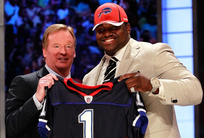 NEW YORK, NY - APRIL 28:  NFL Commissioner Roger Goodell poses for a photo with Marcell Dareus, #3 overall pick by the Buffalo Bills, as Dareus holds up a jersey during the 2011 NFL Draft at Radio City Music Hall on April 28, 2011 in New York City.  (Photo by Chris Trotman/Getty Images)