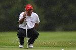 STOKE POGES, ENGLAND - JULY 21:  Ricky Ponting, Australia Cricket Captain lines up a putt during the Child Bereavement Charity Ashes Golf Challenge at Stoke Park on July 21, 2009 in Stoke Poges, England.  (Photo by Julian Finney/Getty Images)