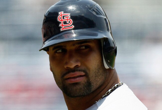 ATLANTA, GA - MAY 01:  Albert Pujols #5 of the St. Louis Cardinals looks back at the homeplate umpire after striking out against the Atlanta Braves at Turner Field on May 1, 2011 in Atlanta, Georgia.  (Photo by Kevin C. Cox/Getty Images)