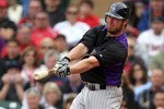 SCOTTSDALE, AZ - FEBRUARY 26:  Ian Stewart #9 of the Colorado Rockies swings during the game against the Arizona Diamondbacks at Salt River Fields on February 26, 2011in Scottsdale, Arizona..  (Photo by Jonathan Ferrey/Getty Images)