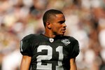OAKLAND, CA - SEPTEMBER 27:  Nnamdi Asomugha #21 takes off his helmet during a break in play in their game against the Denver Broncos at the Oakland-Alameda County Coliseum on September 27, 2009 in Oakland, California.  (Photo by Ezra Shaw/Getty Images)