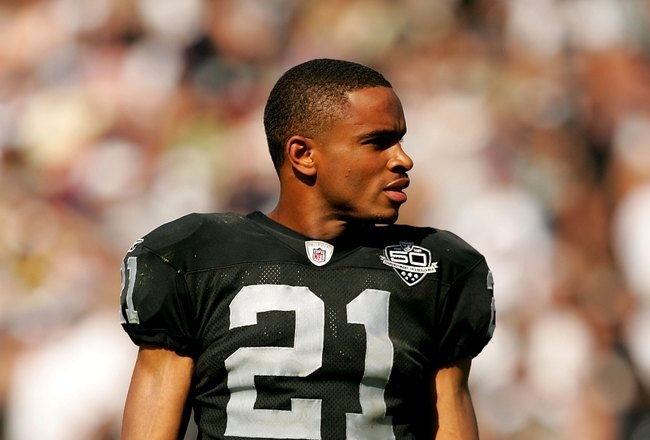 OAKLAND, CA - SEPTEMBER 27:  Nnamdi Asomugha #21 takes off his helmet during a break in play in their game against the Denver Broncos at the Oakland-Alameda County Coliseum on September 27, 2009 in Oakland, California.  (Photo by Ezra Shaw/Getty Images)