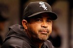 ST PETERSBURG, FL - APRIL 21:  Manager Ozzie Guillen #13 of the Chicago White Sox smiles against the Tampa Bay Rays during the game at Tropicana Field on April 21, 2011 in St. Petersburg, Florida.  (Photo by J. Meric/Getty Images)