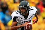 COLUMBIA, MO - SEPTEMBER 13:  Quarterback Colin Kaepernick #10 of the Nevada Wolf Pack rolls out during the first half of the game against the Missouri Tigers on September 13, 2008 at Memorial Stadium in Columbia, Missouri.  (Photo by Jamie Squire/Getty Images)