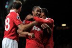 MANCHESTER, ENGLAND - MAY 04:  Anderson of Manchester United celebrates scoring his team's third goal with his team mates during the UEFA Champions League Semi Final second leg match between Manchester United and Schalke at Old Trafford on May 4, 2011 in Manchester, England.  (Photo by Michael Regan/Getty Images)