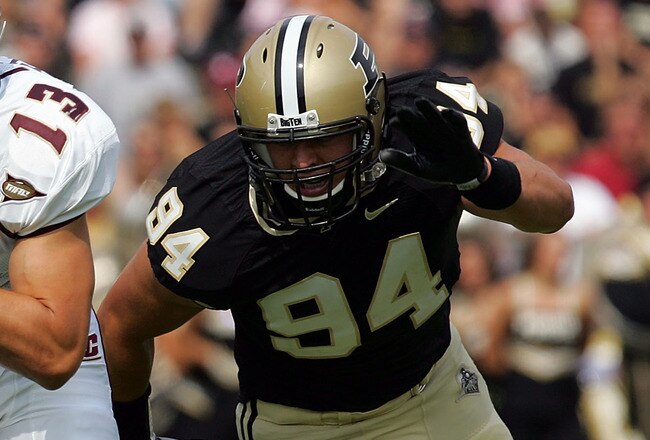 WEST LAFAYETTE, IN - SEPTEMBER 20:  Quarterback Dan LeFevour #13 of the Central Michigan Chippewas runs the ball past Ryan Kerrigan #94 of the Purdue Boilermakers at Ross-Ade Stadium on September 20, 2008 in West Lafayette, Indiana.  (Photo by Ronald Martinez/Getty Images)