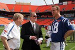 MIAMI GARDENS, FL - FEBRUARY 02:  (L-R) General manager Bill Polian, team owner Jim Irsay and Peyton Manning #18 of the Indianapolis Colts look on during Super Bowl XLIV Media Day at Sun Life Stadium on February 2, 2010 in Miami Gardens, Florida.  (Photo by Doug Benc/Getty Images)