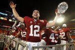 MIAMI, FL - JANUARY 03: Orange bowl MVP Andrew Luck #12 of the Stanford Cardinal celebrates after Stanford won 40-12 against the Virginia Tech Hokies during the 2011 Discover Orange Bowl at Sun Life Stadium on January 3, 2011 in Miami, Florida. (Photo by Streeter Lecka/Getty Images)
