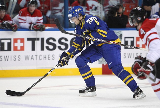 BUFFALO, NY - DECEMBER 31: Defenseman Adam Larsson #5 of Sweden carries the puck during the 2011 IIHF World U20 Championship game between Canada and Sweden on December 31, 2010 at HSBC Arena in Buffalo, New York. (Photo by Tom Szczerbowski/Getty Images)