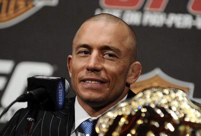 NEW YORK - MARCH 24:  Georges St-Pierre of Montreal, Quebec, Canada speaks at a press conference for UFC 111 at Radio City Music Hall on March 24, 2010 in New York City.  St-Pierre will face Dan Hardy of Nottingham UK in the Welterweight title bout. (Photo by Jeff Zelevansky/Getty Images)