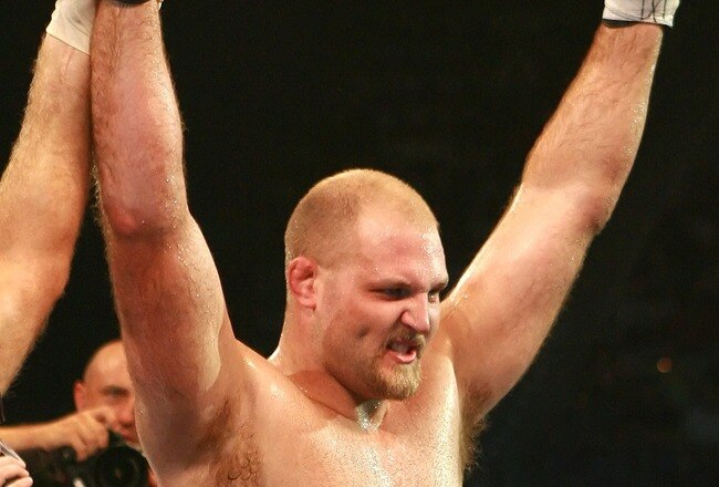 HOLLYWOOD, FL - SEPTEMBER 20:  Ben Rothwell (yellow trunks) celebrates his victory over Ricco Rodriguez during their heavyweight bout during the IFL finals at the Seminole Hard Rock Casino on September 20, 2007 in Hollywood, Florida.  (Photo by Doug Benc/Getty Images for IFL)