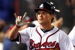 ATLANTA, GA - MAY 04:  Nate McLouth #13 of the Atlanta Braves reacts after hitting a two-run homer in the fourth inning against the Milwaukee Brewers at Turner Field on May 4, 2011 in Atlanta, Georgia.  (Photo by Kevin C. Cox/Getty Images)