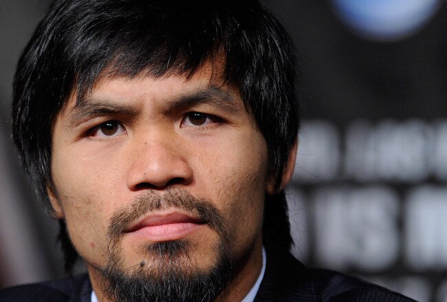 LAS VEGAS, NV - MAY 04:  Boxer Manny Pacquiao appears during the final news conference for his bout against Shane Mosley at the MGM Grand Hotel/Casino May 4, 2011 in Las Vegas, Nevada. Pacquiao will defend his WBO welterweight title against Mosley on May 7, 2011 in Las Vegas.  (Photo by Ethan Miller/Getty Images)