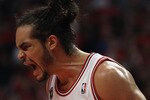 CHICAGO, IL - APRIL 16: Joakim Noah #13 of the Chicago Bulls celebrates a win over the Indiana Pacers in Game One of the Eastern Conference Quarterfinals in the 2011 NBA Playoffs at the United Center on April 16, 2011 in Chicago, Illinois. The Bulls defeated the Pacers 104-99. NOTE TO USER: User expressly acknowledges and agrees that, by downloading and/or using this photograph, User is consenting to the terms and conditions of the Getty Images License Agreement. (Photo by Jonathan Daniel/Getty Images)