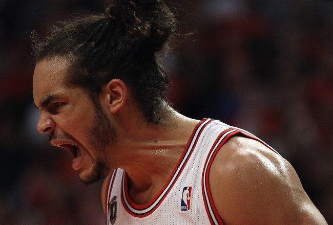 CHICAGO, IL - APRIL 16: Joakim Noah #13 of the Chicago Bulls celebrates a win over the Indiana Pacers in Game One of the Eastern Conference Quarterfinals in the 2011 NBA Playoffs at the United Center on April 16, 2011 in Chicago, Illinois. The Bulls defeated the Pacers 104-99. NOTE TO USER: User expressly acknowledges and agrees that, by downloading and/or using this photograph, User is consenting to the terms and conditions of the Getty Images License Agreement. (Photo by Jonathan Daniel/Getty Images)