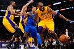 LOS ANGELES, CA - MAY 04:  Kobe Bryant #24 of the Los Angeles Lakers goes after a loose ball in front of Shawn Marion #0 of the Dallas Mavericks in the second quarter in Game Two of the Western Conference Semifinals in the 2011 NBA Playoffs at Staples Center on May 4, 2011 in Los Angeles, California. NOTE TO USER: User expressly acknowledges and agrees that, by downloading and or using this photograph, User is consenting to the terms and conditions of the Getty Images License Agreement.  (Photo by Kevork Djansezian/Getty Images)