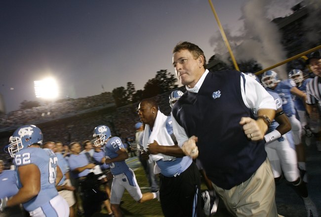 CHAPEL HILL, NC - OCTOBER 4:  Head coach Butch Davis of the North Carolina Tar Heels runs onto the field before the game against the Connecticut Huskies at Kenan Stadium on October 4, 2008 in Chapel Hill, North Carolina.  (Photo by Kevin C. Cox/Getty Images)
