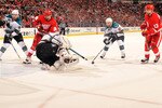 DETROIT - MAY 4:  Pavel Datsyuk #13 of the Detroit Red Wings scores a power play goal in the second period on goaltender Antti Niemi #31 of the San Jose Sharks in Game Three of the Western Conference Semifinals during the 2011 NHL Stanley Cup Playoffs on May 4, 2011 at Joe Louis Arena in Detroit, Michigan. San Jose defeated Detroit 4-3 in overtime.   (Photo by Jamie Sabau/Getty Images)