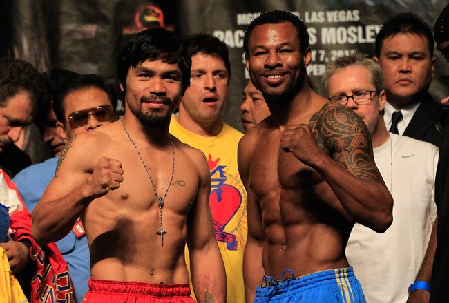 LAS VEGAS, NV - MAY 06:  (L-R) Boxers Manny Pacquiao of the Philippines and Shane Mosley pose after the weigh-in for their WBO welterweight title fight at MGM Grand Garden Arena on May 6, 2011 in Las Vegas, Nevada. Pacquiao will defend his WBO welterweight title against Mosley on May 7, 2011 in Las Vegas  (Photo by Chris Trotman/Getty Images)