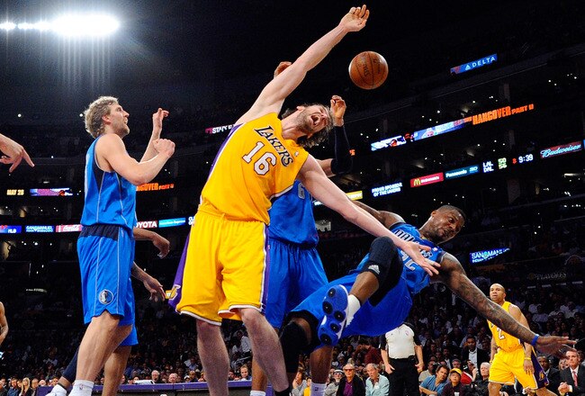 LOS ANGELES, CA - MAY 04:  Pau Gasol #16 of the Los Angeles Lakers reacts as he has his shot blocked from behind by DeShawn Stevenson #92 of the Dallas Mavericks in the third quarter in Game Two of the Western Conference Semifinals in the 2011 NBA Playoffs at Staples Center on May 4, 2011 in Los Angeles, California. NOTE TO USER: User expressly acknowledges and agrees that, by downloading and or using this photograph, User is consenting to the terms and conditions of the Getty Images License Agreement.  (Photo by Kevork Djansezian/Getty Images)