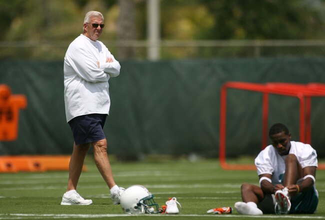DAVIE, FL - MAY 02:  Executive Vice President of Football Operations Bill Parcells (L) walks past a player at practice on during Miami Dolphins Rookie Mini Camp on May 2, 2008 at the Dolphins practice facility in Davie, Florida.  (Photo by Marc Serota/Getty Images)