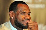 MIAMI - JULY 09:  LeBron James #6, of the Miami Heat smiles during a press conference after a welcome party at American Airlines Arena on July 9, 2010 in Miami, Florida.  (Photo by Doug Benc/Getty Images)