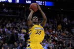 NEWARK, NJ - MARCH 25:  Jimmy Butler #33 of the Marquette Golden Eagles in action against the North Carolina Tar Heels during the east regional semifinal of the 2011 NCAA Men's Basketball Tournament at the Prudential Center on March 25, 2011 in Newark, New Jersey.  (Photo by Chris Trotman/Getty Images)