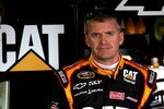 TALLADEGA, AL - APRIL 15: Jeff Burton, driver of the #31 CAT Chevrolet, stands in the garage during practice for the NASCAR Sprint Cup Series Aaron's 499 at Talladega Superspeedway on April 15, 2011 in Talladega, Alabama.  (Photo by Jerry Markland/Getty Images for NASCAR)