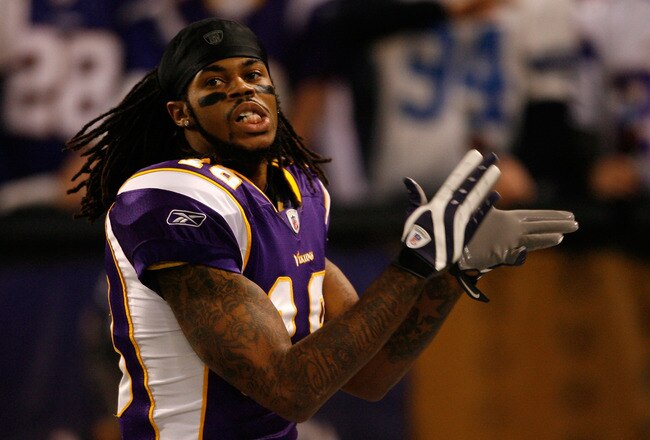 MINNEAPOLIS - JANUARY 17:  Wide receiver Sidney Rice #18 of the Minnesota Vikings celebrates while playing against the Dallas Cowboys during the first half of the NFC Divisional Playoff Game at Hubert H. Humphrey Metrodome on January 17, 2010 in Minneapolis, Minnesota.  The Vikings defeated the Cowboys 34-3. (Photo by Elsa/Getty Images)