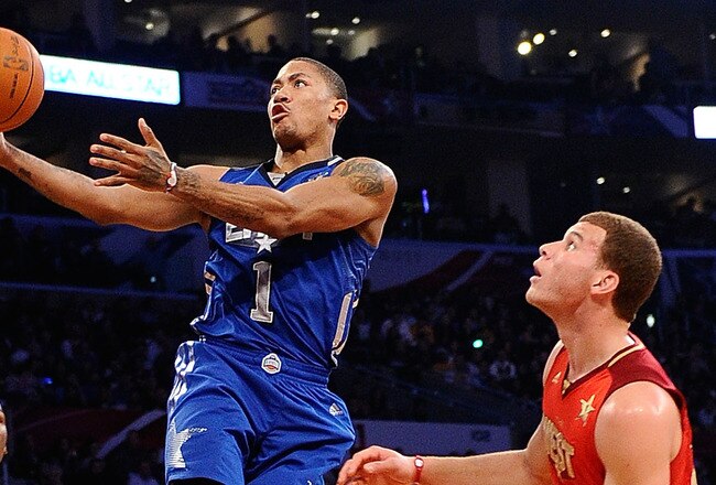LOS ANGELES, CA - FEBRUARY 20:  Derrick Rose #1 of the Chicago Bulls and the Eastern Conference goes up for a layup between Kevin Durant #35 of the Oklahoma City Thunder and the Western Conference and Blake Griffin #32 of the Los Angeles Clippers and the Western Conference in the 2011 NBA All-Star Game at Staples Center on February 20, 2011 in Los Angeles, California. NOTE TO USER: User expressly acknowledges and agrees that, by downloading and or using this photograph, User is consenting to the terms and conditions of the Getty Images License Agreement.  (Photo by Kevork Djansezian/Getty Images)