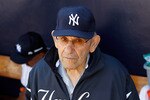 TAMPA, FL - FEBRUARY 26:  Hall of Famer Yogi Berra of the New York Yankees stands in the dugout just prior to the start of the Grapefruit League Spring Training Game against the Philadelphia Phillies at George M. Steinbrenner Field on February 26, 2011 in Tampa, Florida.  (Photo by J. Meric/Getty Images)